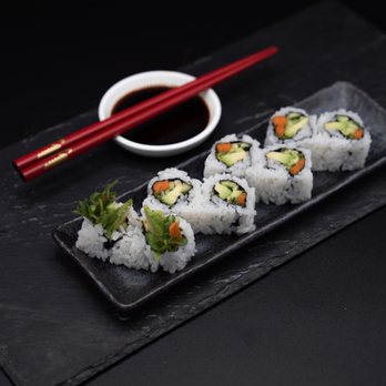 Sushi Dojo - a plate of sushi with chopsticks - Food Delivery Services Near Me Sushi Dojo - a plate of sushi with chopsticks - Food Delivery Services Near Me