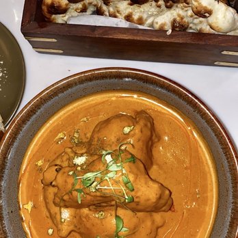 ROOP Chicago Innovative Indian Restaurant & Cocktail Bar - *BUTTER CHICKEN and GARLIC NAAN - Indian Near Me - Chicago, Illinois ROOP Chicago Innovative Indian Restaurant & Cocktail Bar - *BUTTER CHICKEN and GARLIC NAAN - Indian Near Me - Chicago, Illinois