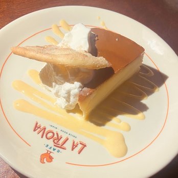 Cafe La Trova - Flan sitting on a delicious guayava dulce de leche - Cocktail Bars Near Me - Miami, Florida