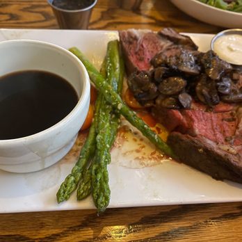 Whiskey Creek - Prime rib with sautéed mushrooms, veggies and balsamic rosemary sauce. - Steakhouses Near Me - Bishop, California Whiskey Creek - Prime rib with sautéed mushrooms, veggies and balsamic rosemary sauce. - Steakhouses Near Me - Bishop, California