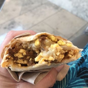 The Coffee Bean & Tea Leaf - Breakfast burrito almost gone! Delicious and hot. - Coffee & Tea Near Me - Santa Ana, California