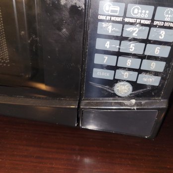 Americas Best Value Inn & Suites Madera - Microwave covered in dirty fingerprints, food residue, stickiness. Filthy! - Hotels Near Me - Madera, California Americas Best Value Inn & Suites Madera - Microwave covered in dirty fingerprints, food residue, stickiness. Filthy! - Hotels Near Me - Madera, California