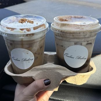 Oralias Bakery - Biscoff cookie latte to the left and brown sugar shaken espresso with banana foam to the right - Bakeries Near Me - Oxnard, California Oralias Bakery - Biscoff cookie latte to the left and brown sugar shaken espresso with banana foam to the right - Bakeries Near Me - Oxnard, California