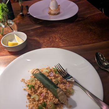 Peak with Priceless Restaurant & Bar - The Peanut Butter Mousse is wrapped in a crunchy shell and surrounded by tasty nougat bits. - New American Near Me - New York, New York