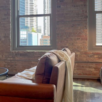 Lux Apartment Living - Living area of one of our furnished apartments - Vacation Rentals Near Me