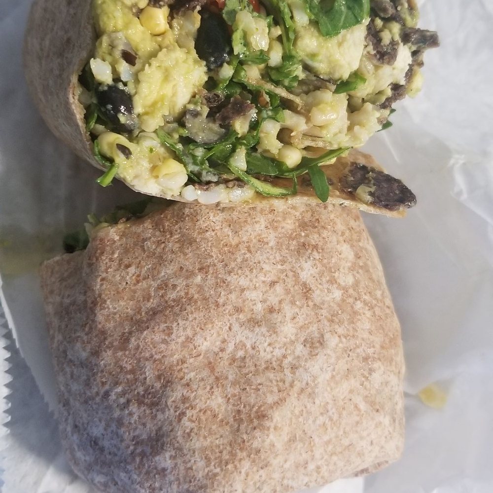 La Ranchera on a wheat wrap: Delicious combination of beans,chicken,avocado & crunched up tortilla chips that will make your tastebuds smile La Ranchera on a wheat wrap: Delicious combination of beans,chicken,avocado & crunched up tortilla chips that will make your tastebuds smile