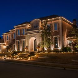 The Christmas Lights Experts - Large home with warm white