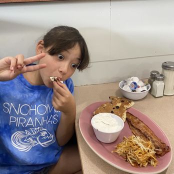 Brianna's Cafe - Kid's chocolate chip pancake and extra crispy bacon. - New American Near Me - Marysville, Washington Brianna's Cafe - Kid's chocolate chip pancake and extra crispy bacon. - New American Near Me - Marysville, Washington