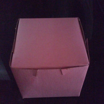 Comet Cafe - i can neither confirm nor deny there is still a pina colada cupcake in this box - Breakfast & Brunch Near Me - Milwaukee, Wisconsin