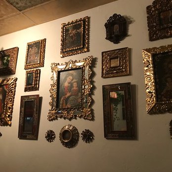 Q'ero Restaurant - Interior. Lots of religious paintings. - Latin American Near Me - Encinitas, California Q'ero Restaurant - Interior. Lots of religious paintings. - Latin American Near Me - Encinitas, California