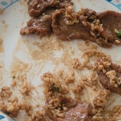 Asian Express - Expensive slop. Fatty and rubbery "beef" and i assume this is rice.