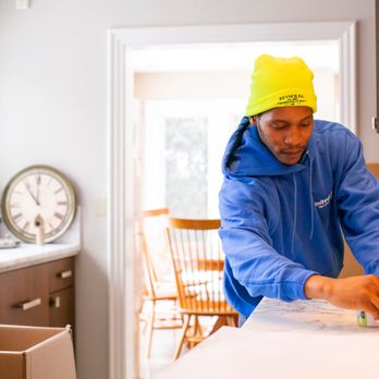 Reynolds Transfer & Storage - Crew member packing household goods for a residential move. Reynolds Transfer & Storage, Inc. - Movers Near Me - Madison, Wisconsin Reynolds Transfer & Storage - Crew member packing household goods for a residential move. Reynolds Transfer & Storage, Inc. - Movers Near Me - Madison, Wisconsin