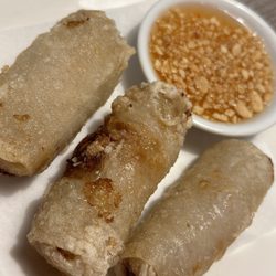 Thai Noodle & Sushi Cuisine - Thai rolls filled with ground pork and vegetables served with a plum and crushed peanut sauce.