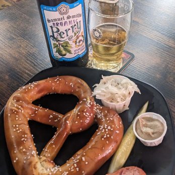 Yoerg Beer and Saloon - Pear cider 18oz knackwurst with pretzel plate. - German Near Me - Saint Paul, Minnesota Yoerg Beer and Saloon - Pear cider 18oz knackwurst with pretzel plate. - German Near Me - Saint Paul, Minnesota