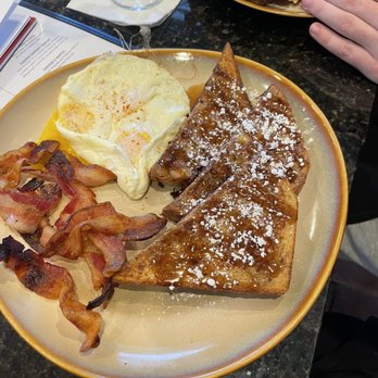 Curio Bistro - French toast and eggs - Cajun/Creole Near Me - New Orleans, Louisiana