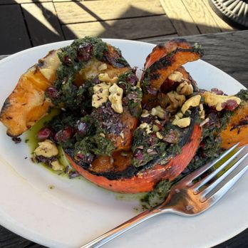 Gjelina - Grilled Kabocha Squash with Mint Pistou, Pomegranate, and red walnuts - New American Near Me - Venice, California