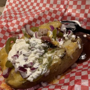 Hucklebuck Smoke & Grill - Queen size brisket baked potato comes with garlic bread - Barbeque Near Me - Seymour, Missouri Hucklebuck Smoke & Grill - Queen size brisket baked potato comes with garlic bread - Barbeque Near Me - Seymour, Missouri