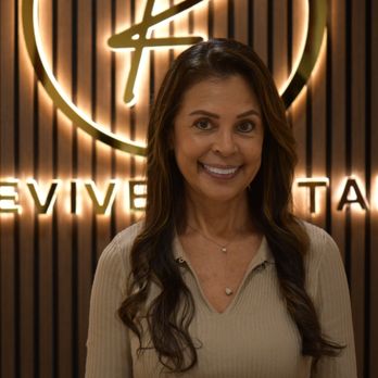Revive Dental - Happy female patient smiling at Revive Dental - General Dentistry Near Me - Fort Lauderdale, Florida Revive Dental - Happy female patient smiling at Revive Dental - General Dentistry Near Me - Fort Lauderdale, Florida
