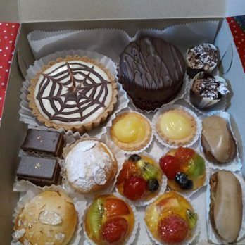 Ooh La La Bakery - A nice mix of pastries. Chocolate cheese cake, chocolate mouse cake, mini pastries. So good. Excellent quality and nice staff. - Bakeries Near Me - Silver Spring, Maryland