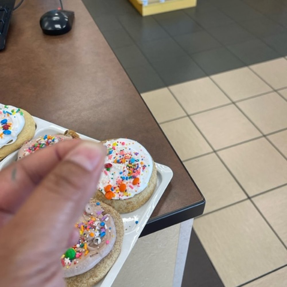 Edible Arrangements - a person holding a plate of decorated cookies - Chocolatiers & Shops Near Me - Columbia, South Carolina