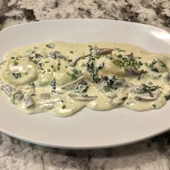 Caffe Del Corso - Spinach Ravioli w. Garlic Chive Funghi Cream Sauce - Cafes Near Me - Vestal, New York Caffe Del Corso - Spinach Ravioli w. Garlic Chive Funghi Cream Sauce - Cafes Near Me - Vestal, New York