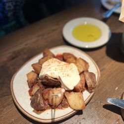 Barcelona Wine Bar - Patatas Bravas. These were a table favorite! That red sauce with that garlic aioli (we think that's what it was) SO GOOD!