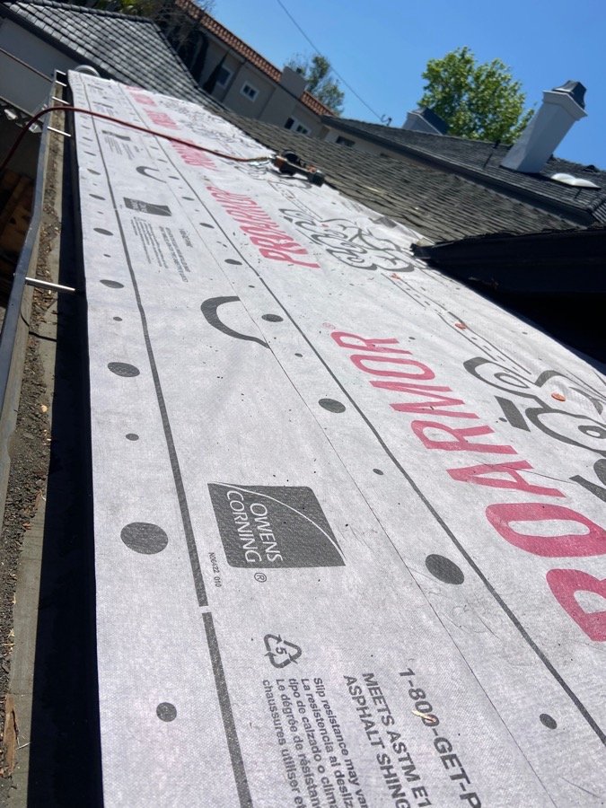 Slide of Green Leaf Roofers