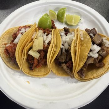 El Rumbero Taqueria - Left to right. Taco de chicharrón prensado, taco de pastor with pineapple, taco campechano(steak and pastor) and taco de suadero. - Mexican Near Me - The Colony, Texas El Rumbero Taqueria - Left to right. Taco de chicharrón prensado, taco de pastor with pineapple, taco campechano(steak and pastor) and taco de suadero. - Mexican Near Me - The Colony, Texas