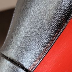 Anthony's Shoe Repair - See the red on the black? Sloppy work.