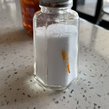 Rice Paper - Salt shaker that is dirty with leftover food. - Vietnamese Near Me - Scottsdale, Arizona Rice Paper - Salt shaker that is dirty with leftover food. - Vietnamese Near Me - Scottsdale, Arizona