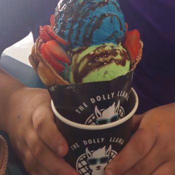 The Dolly Llama - Bubble cone w 2 scoops and strawberries - Ice Cream & Frozen Yogurt Near Me - McKinney, Texas The Dolly Llama - Bubble cone w 2 scoops and strawberries - Ice Cream & Frozen Yogurt Near Me - McKinney, Texas