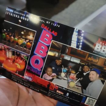 Dallas BBQ - a man holding a ticket for a bbq - Barbeque Near Me - Rego Park, New York Dallas BBQ - a man holding a ticket for a bbq - Barbeque Near Me - Rego Park, New York
