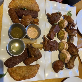 Latin Flavor Restaurant - Appetizer sampler & Mofongo sampler. Both delicious! - Latin American Near Me - Melbourne, Florida Latin Flavor Restaurant - Appetizer sampler & Mofongo sampler. Both delicious! - Latin American Near Me - Melbourne, Florida