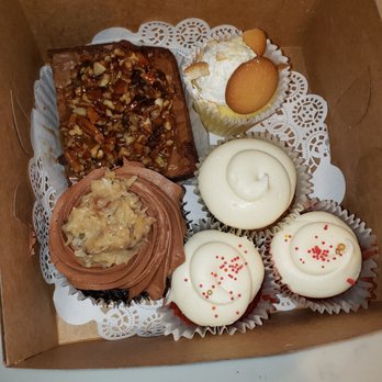 Sweet Brown Suga - Two regular red velvet cupcakes, carrot cake, banana pudding, a jumbo German chocolate cupcake and a turtle brownie. So good! - Cafes Near Me - Grayson, Georgia Sweet Brown Suga - Two regular red velvet cupcakes, carrot cake, banana pudding, a jumbo German chocolate cupcake and a turtle brownie. So good! - Cafes Near Me - Grayson, Georgia