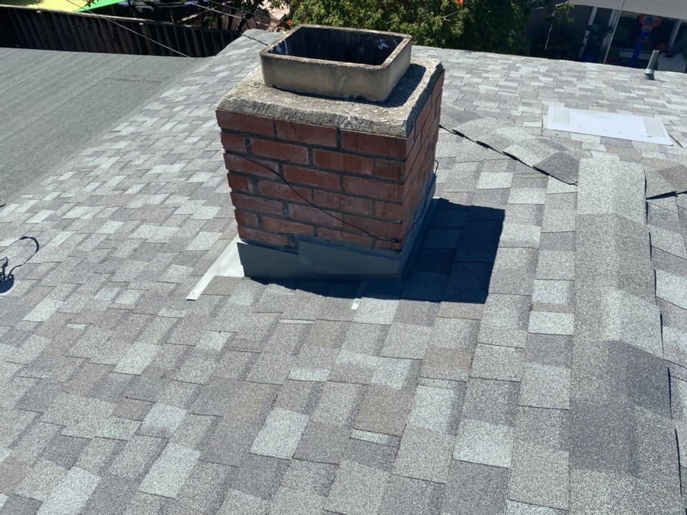 Slide of Tip Top Roofing