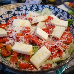 Pizzeria Vincenzo Capuano - GRECA: Lettuce, tomato, onion, feta, olive, EVOO and salt.