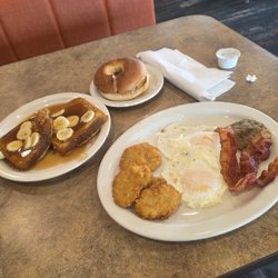 Eat'n Park - My breakfast I have enough French toast bagel with cream cheese potato cakes eggs over easy bacon and sausage mixed combo