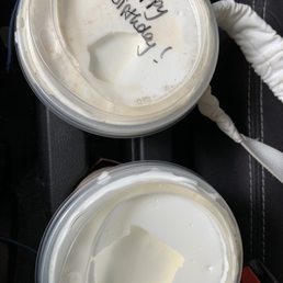 two cups of coffee with a note written on them