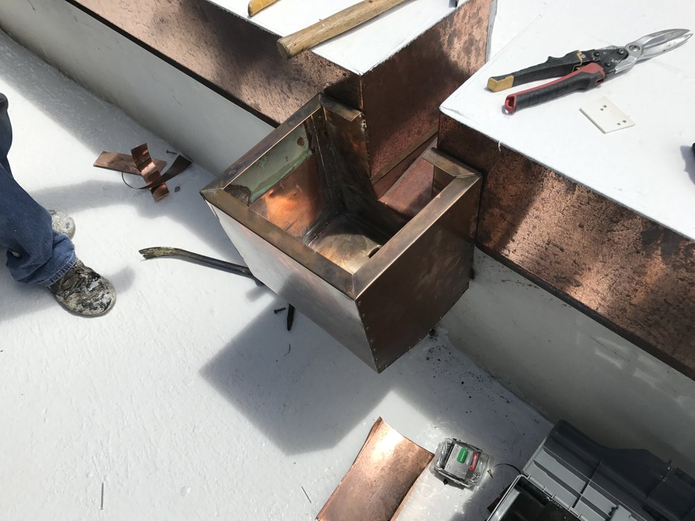 Slide of Heritage Roofing & Waterproofing