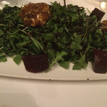 Prime One Twelve - Arugula salad with walnut crusted goat cheese and beets. Big enough for four people - Steakhouses Near Me - Miami Beach, Florida Prime One Twelve - Arugula salad with walnut crusted goat cheese and beets. Big enough for four people - Steakhouses Near Me - Miami Beach, Florida