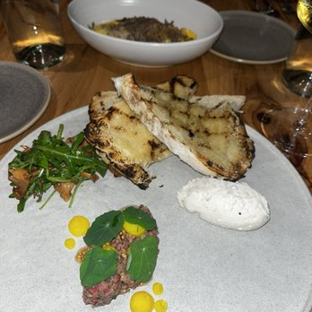 Rootstalk - Roasted Bone Marrow Brûlée Prime Beef Tartare, Toasted Grains, Grilled Sourdough, Pickled Crosnes - New American Near Me - Breckenridge, Colorado Rootstalk - Roasted Bone Marrow Brûlée Prime Beef Tartare, Toasted Grains, Grilled Sourdough, Pickled Crosnes - New American Near Me - Breckenridge, Colorado