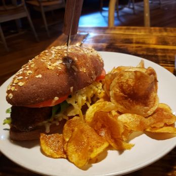 The Floridian - Spicy Melt sandwich with Mahi-Mahi and fresh potatoe chips. - Southern Near Me - Saint Augustine, Florida The Floridian - Spicy Melt sandwich with Mahi-Mahi and fresh potatoe chips. - Southern Near Me - Saint Augustine, Florida