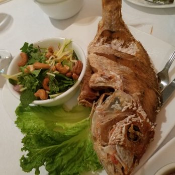 SriPraPhai Thai Restaurant - Whole red snapper with sour-spicy papaya salad - Thai Near Me - Williston Park, New York SriPraPhai Thai Restaurant - Whole red snapper with sour-spicy papaya salad - Thai Near Me - Williston Park, New York