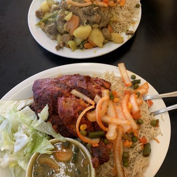 Jubba Restaurant - two plates of food on a table - African Near Me - Windsor, Ontario Jubba Restaurant - two plates of food on a table - African Near Me - Windsor, Ontario