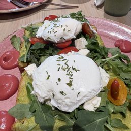 Avocado toast and apple rose in the background Avocado toast and apple rose in the background