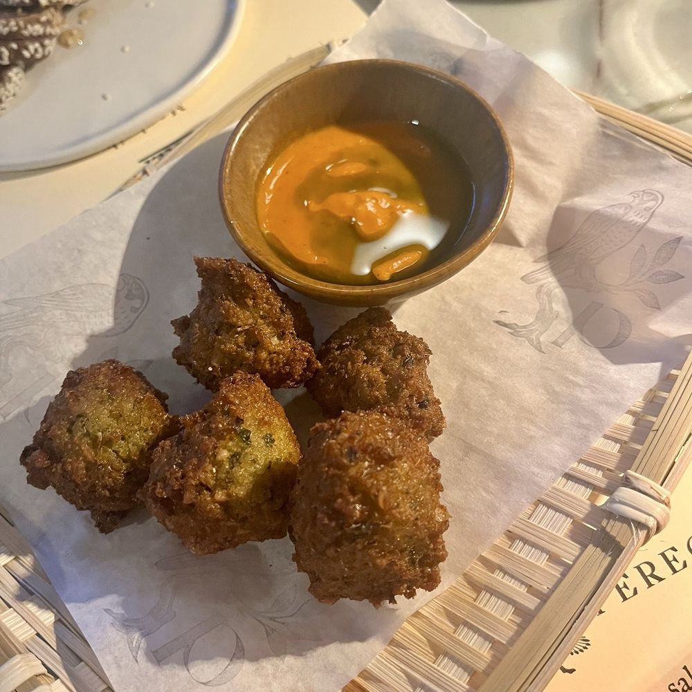 Peregrine - Field Pea Fritters with spicy tomato jam - American Near Me - Raleigh, North Carolina Peregrine - Field Pea Fritters with spicy tomato jam - American Near Me - Raleigh, North Carolina