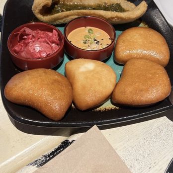 Traif - Cod with a modern twist served with fried buns! - New American Near Me - Brooklyn, New York