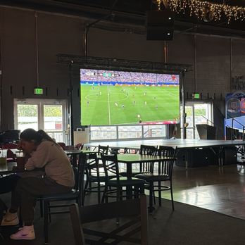Maiz y Fuego - Seating area with large screen - Mexican Near Me - Aurora, Colorado Maiz y Fuego - Seating area with large screen - Mexican Near Me - Aurora, Colorado