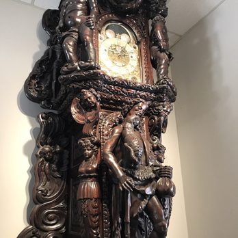 Lightner Museum - This wooden hand carved clock that greets you when you come in - can you imagine someone carving this by hand? - Museums Near Me - Saint Augustine, Florida Lightner Museum - This wooden hand carved clock that greets you when you come in - can you imagine someone carving this by hand? - Museums Near Me - Saint Augustine, Florida