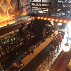 Second floor seating overlooking the bar and the George Dureau painting